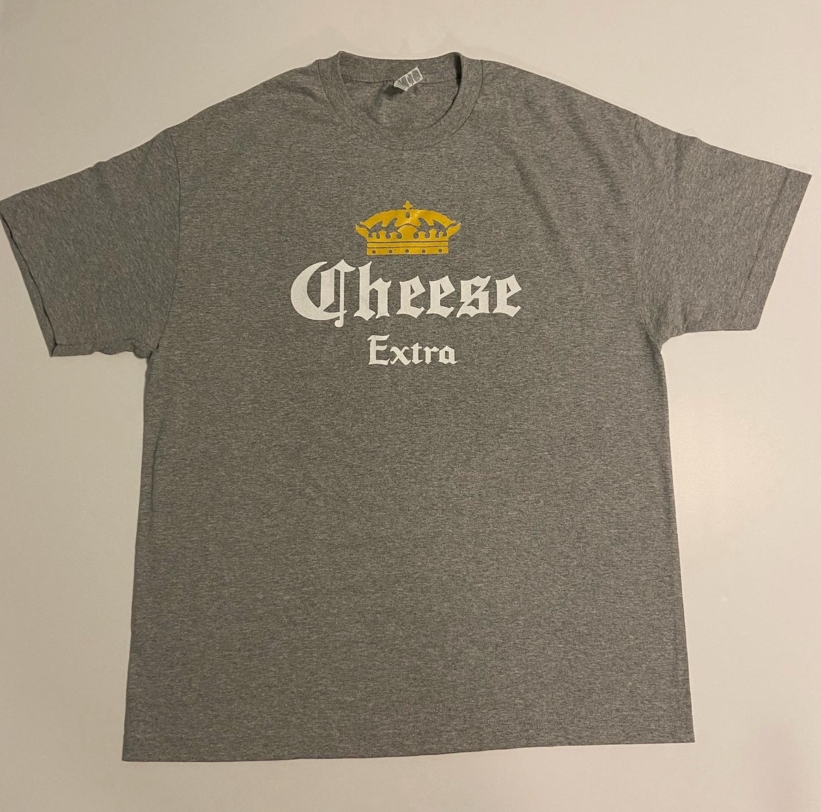 Cheeseaholic T-Shirt - Black unisex tee with bold cheese lover graphic design